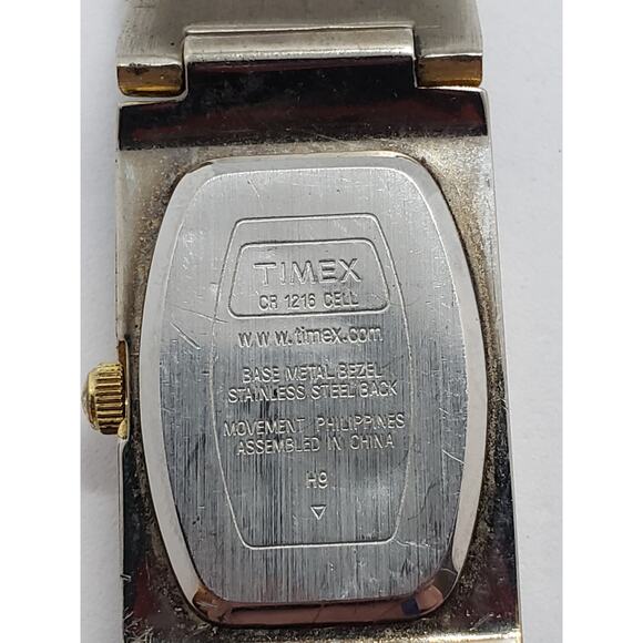 Women\'s Timex dress watch. Square white iridescent face. Large gold bevel main image 4